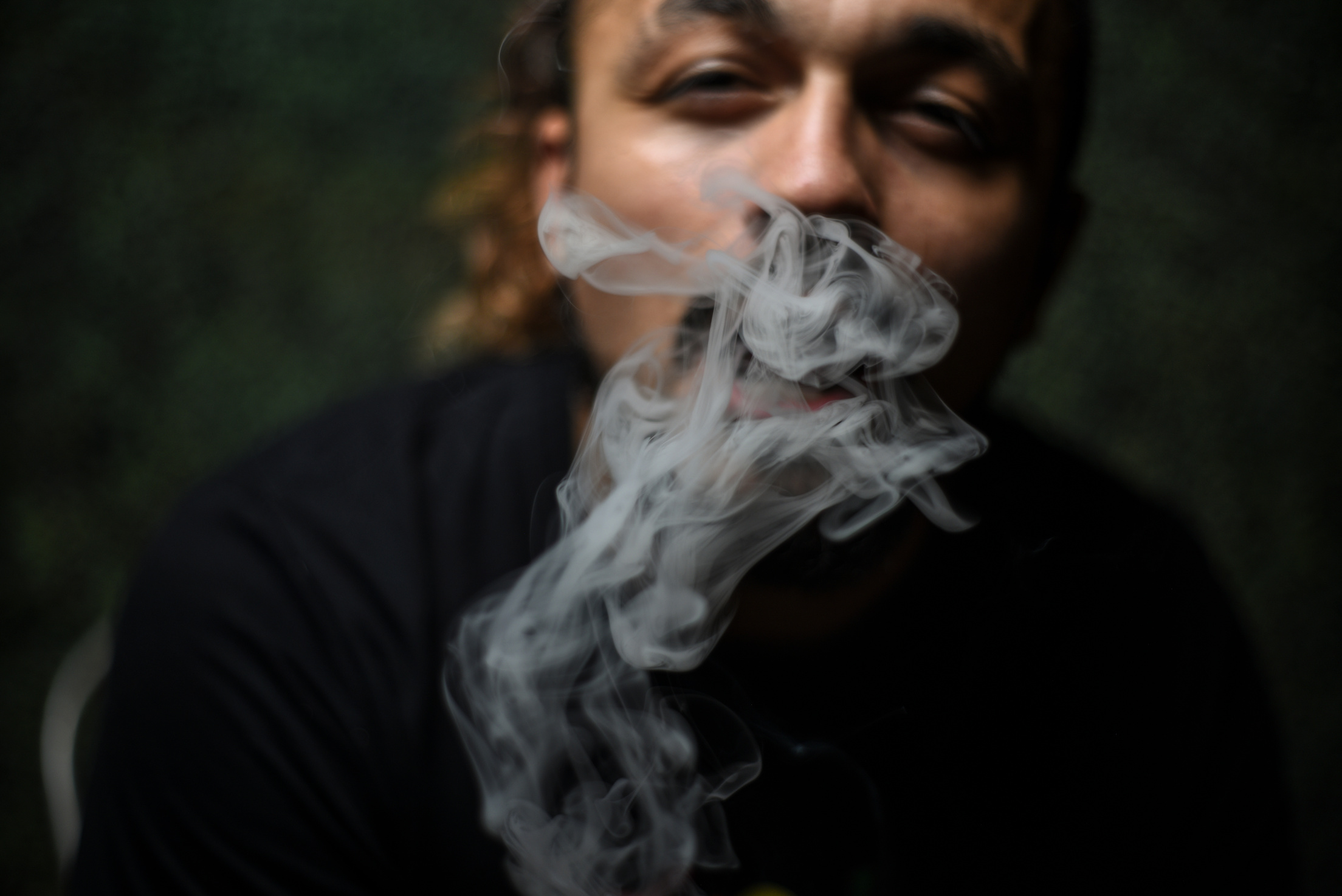 Photo of a Man with Smoke 